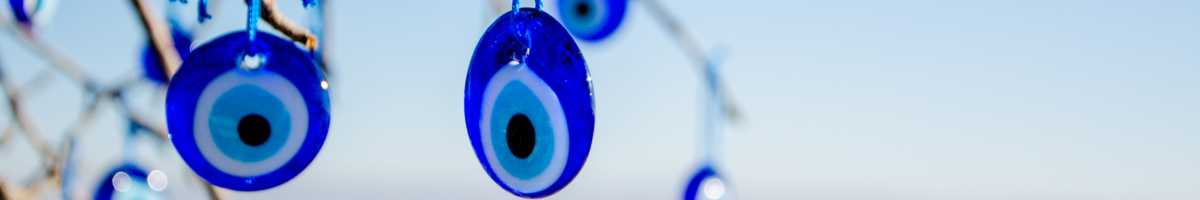 Blue evil eye bracelet with beads for protection.